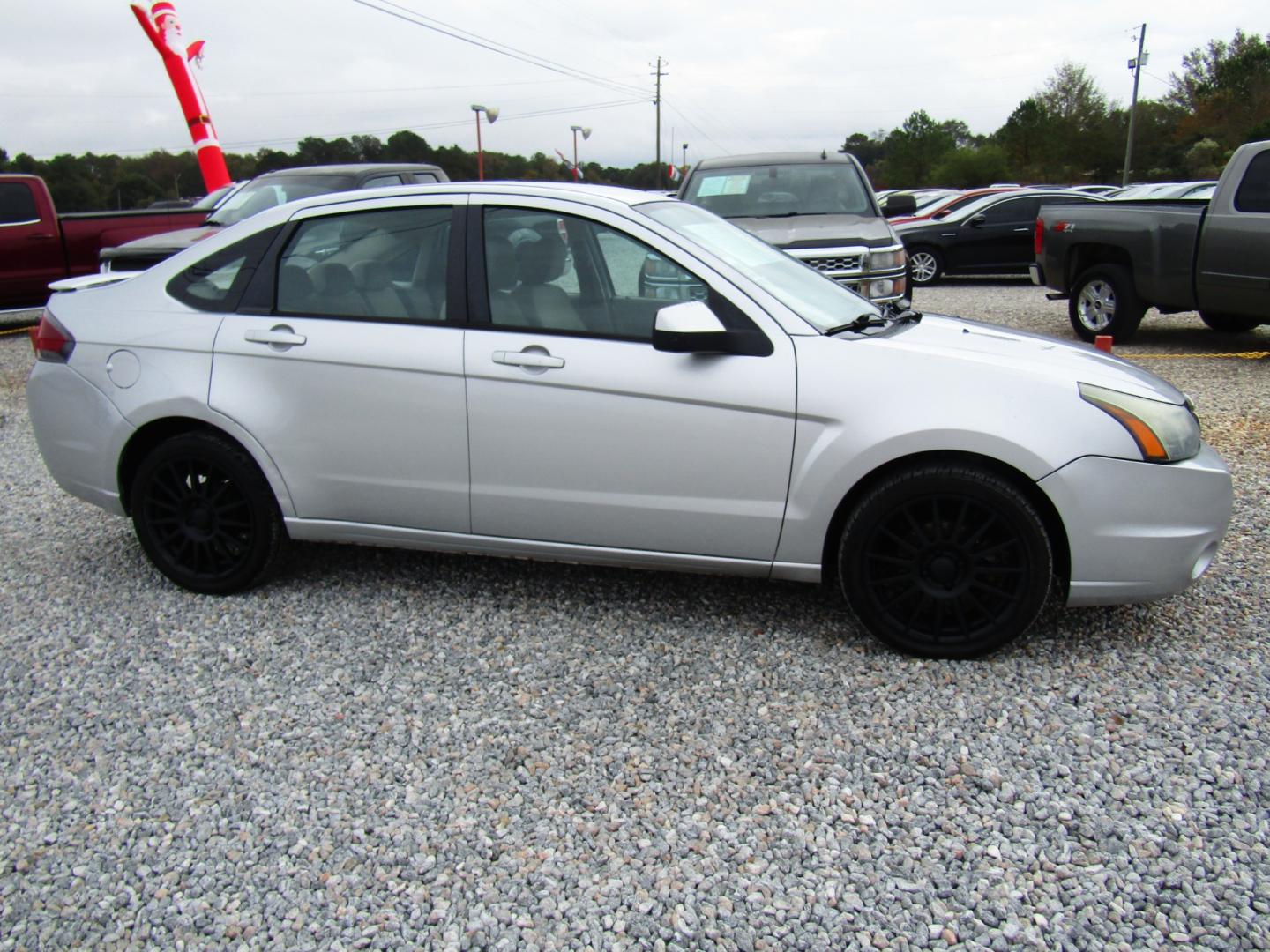 2011 Silver /Gray Ford Focus SES Sedan (1FAHP3GN4BW) with an 2.0L L4 DOHC 16V engine, Automatic transmission, located at 15016 S Hwy 231, Midland City, AL, 36350, (334) 983-3001, 31.306210, -85.495277 - Photo#0